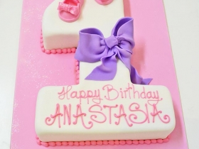 NUMBER 1 PINK BABY CAKE WITH SHOES AND BOW