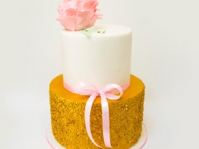 GOLD AND PALE PINK 2 TIERED CAKE WITH PEONY
